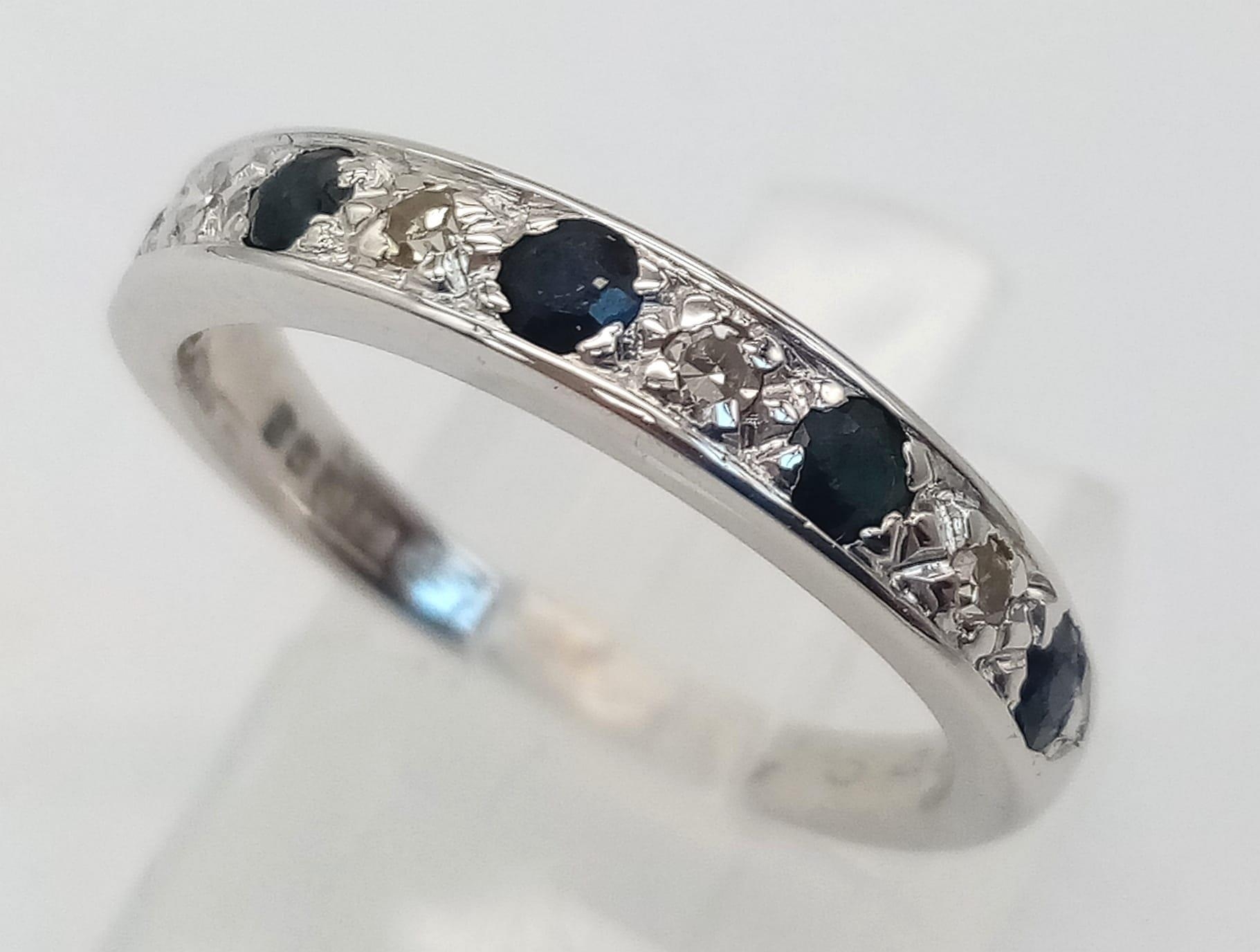 AN 18K WHITE GOLD DIAMOND & SAPPHIRE HALF ETERNITY RING. Size L/M, 3.2g total weight. - Image 2 of 4