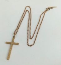 A Vintage 9K Yellow Gold Cross Pendant on a 9K Yellow Gold Chain. 44cm necklace length. 4cm