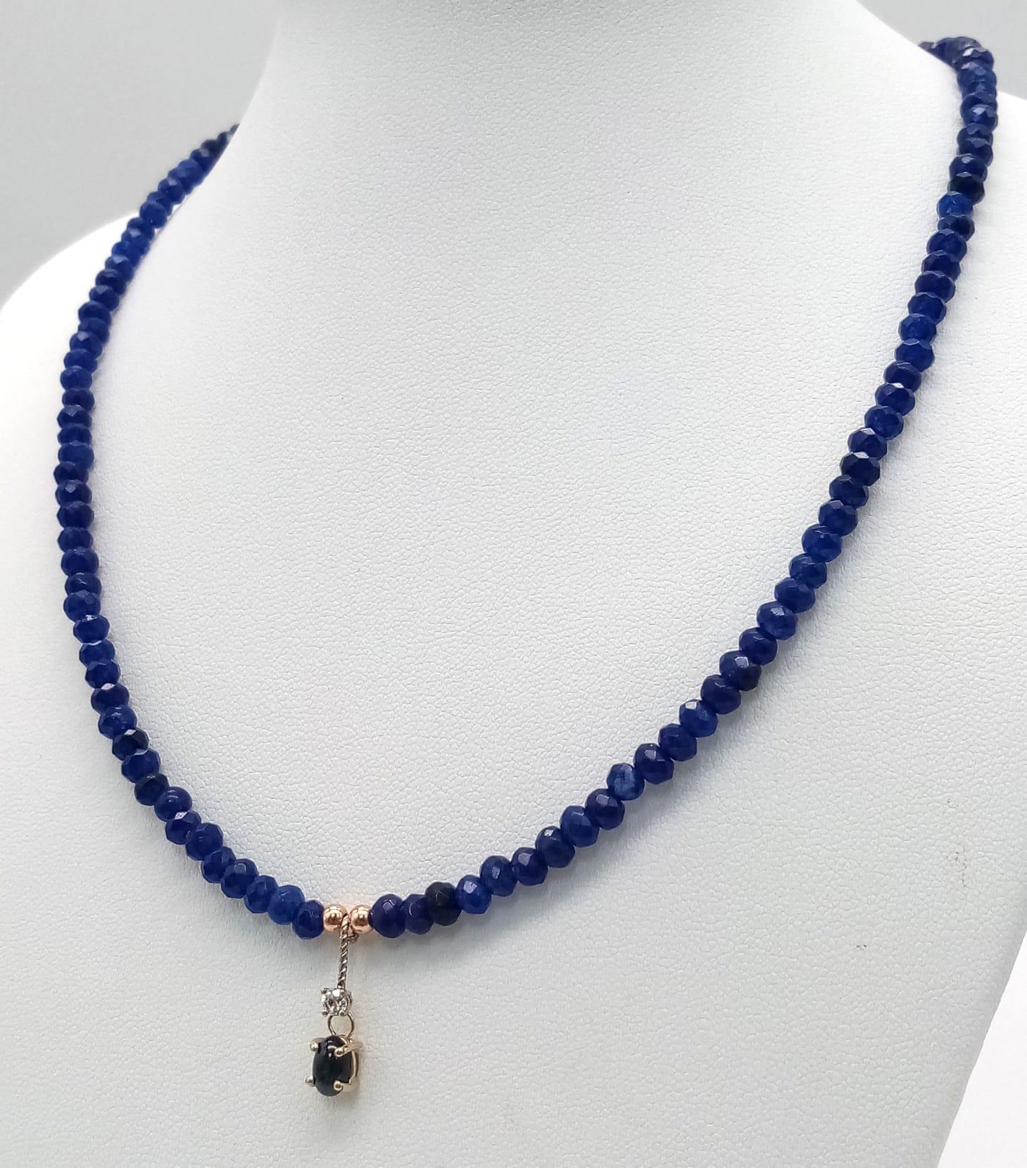 A Sapphire Small Bead Necklace with Diamond and Sapphire Hanging Decoration. 0.07ct diamond. 14k - Image 2 of 4