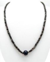 A Jasper Small Bead Necklace with a Cultured Pearl Interrupter. 50cm length. 14k gold clasp.