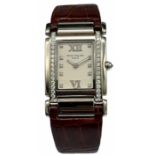 A Vintage Patek Philippe 18K White Gold and Diamond Ladies Watch. Brown leather strap with 18k