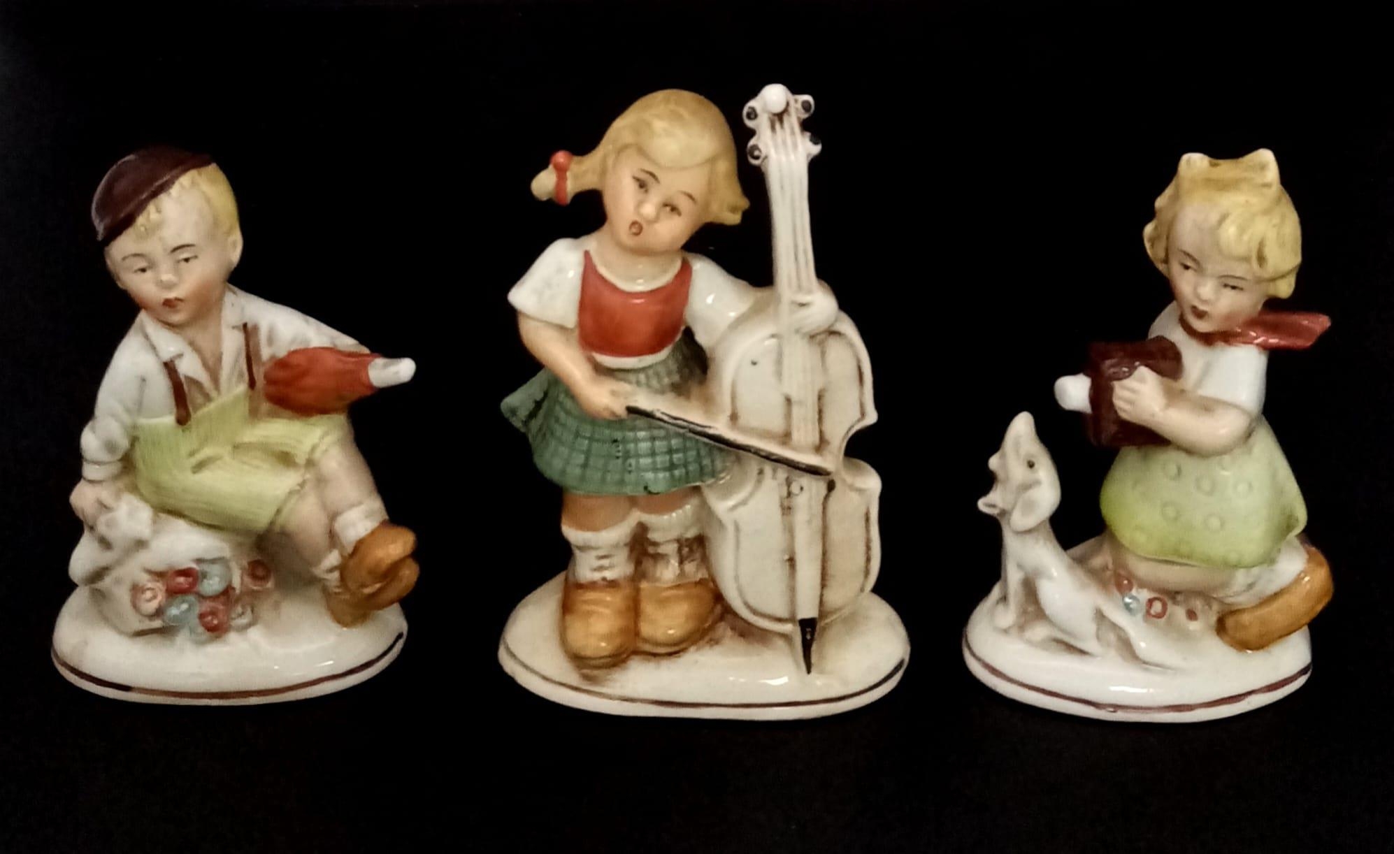 Four Hand-Made Vintage German Schaubach Kunst Children Porcelain Figures. All are marked Germany