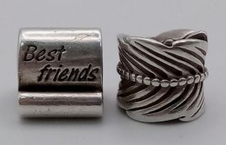 Two pretty sterling silver Pandora charms. One engraved 'Best friends', one rolled feather.