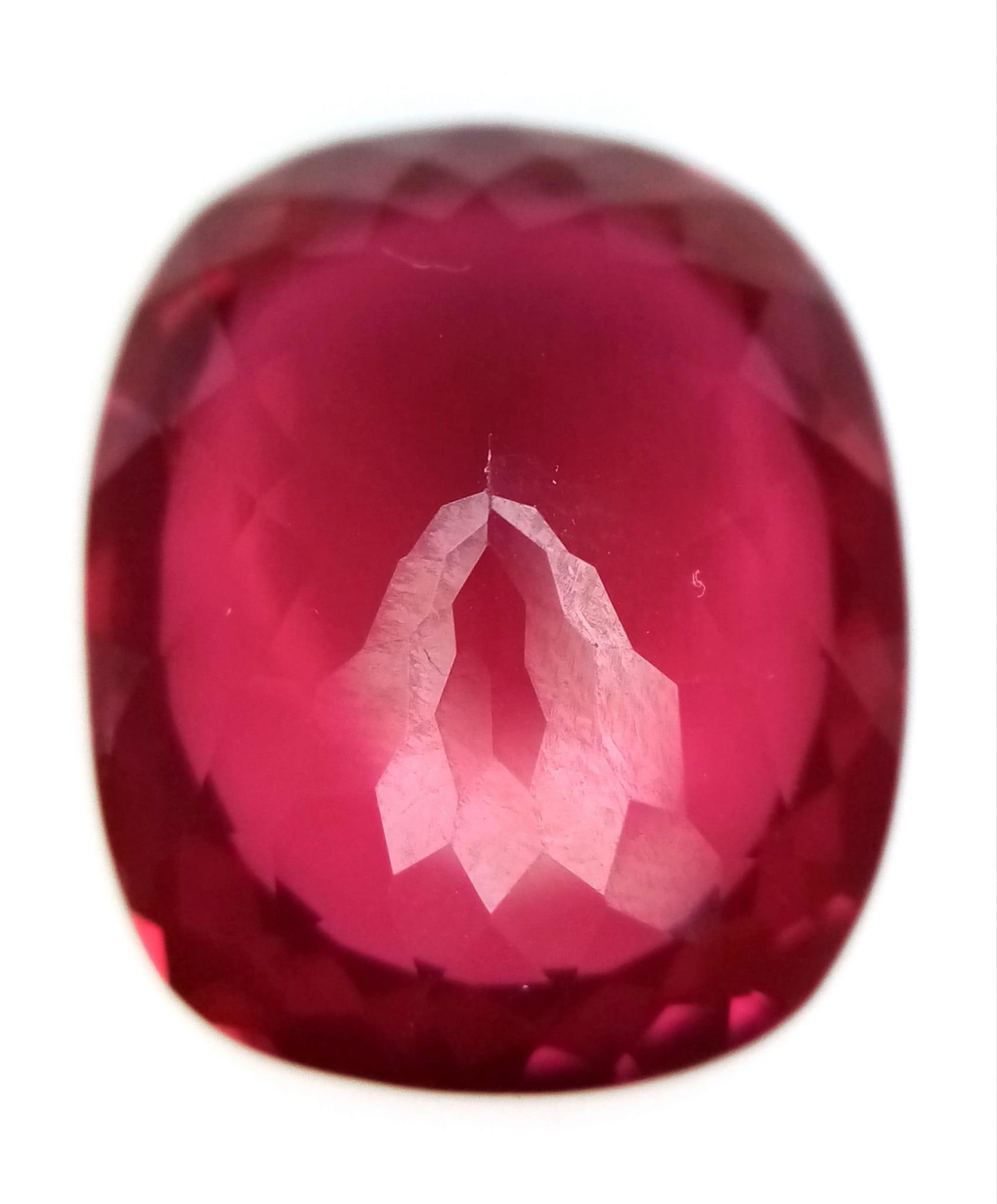 A 27ct Pink/Red Oval Cut Kunzite Gemstone. Well faceted with no visible marks or inclusions. No - Image 3 of 4