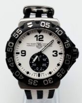 A Tag Heuer Formula 1 - Professional 200M Gents Watch. Custom textile strap. Stainless steel and