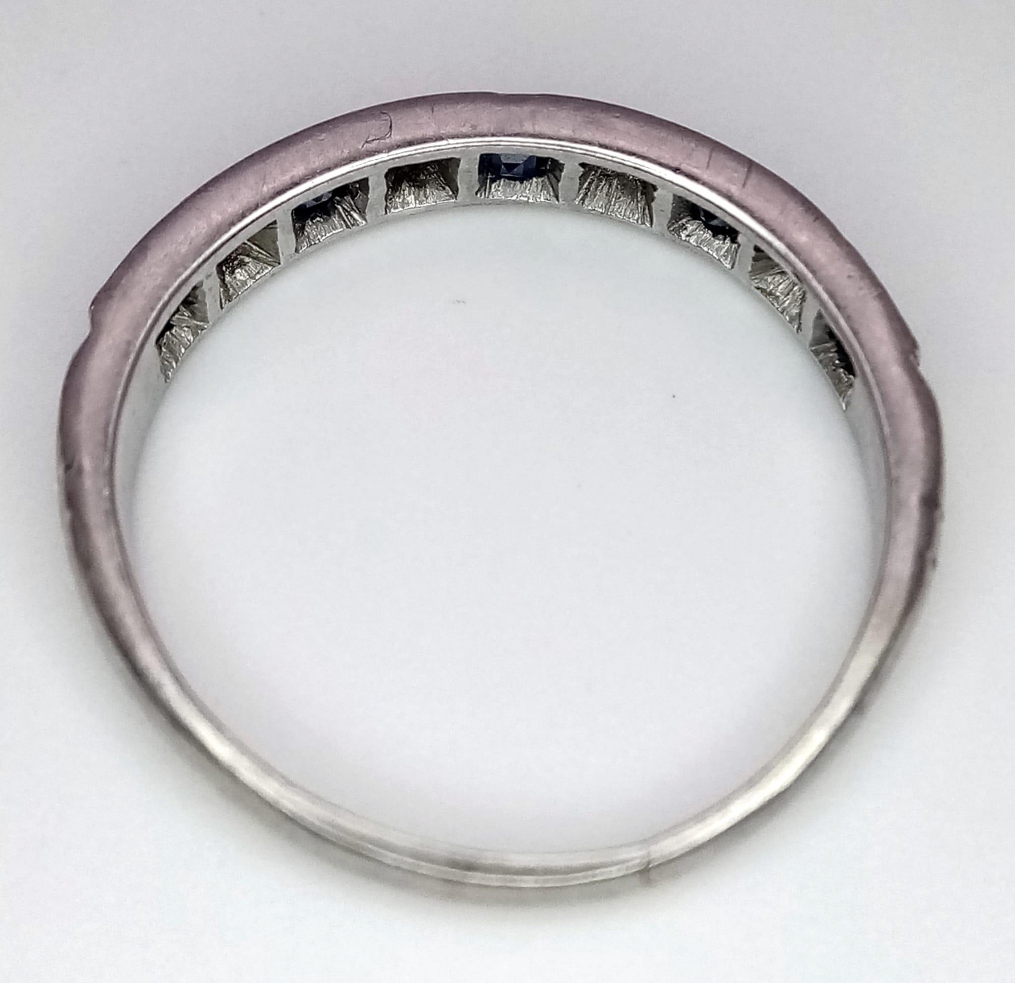9k white gold diamond and sapphire half eternity ring. Weight: 3.1g Size O (dia:0.08ct/sapp:0.35ct) - Image 3 of 3