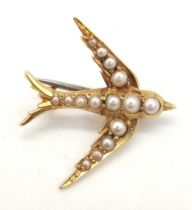 A Lovely 15K Yellow Gold and Pearl Bird in Flight Brooch. Graduated seed pearls. Pin has been