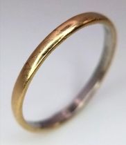 A Platinum and 9K Gold Band Ring. Size Q. 1.49g weight.