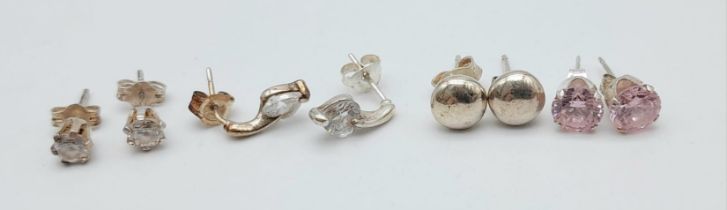 Four pairs of 925 Silver Different Style Stud Earrings.