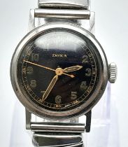 A Rare Vintage Doxa Watch. Expandable steel strap. Case - 28mm. Black dial. Mechanical movement.