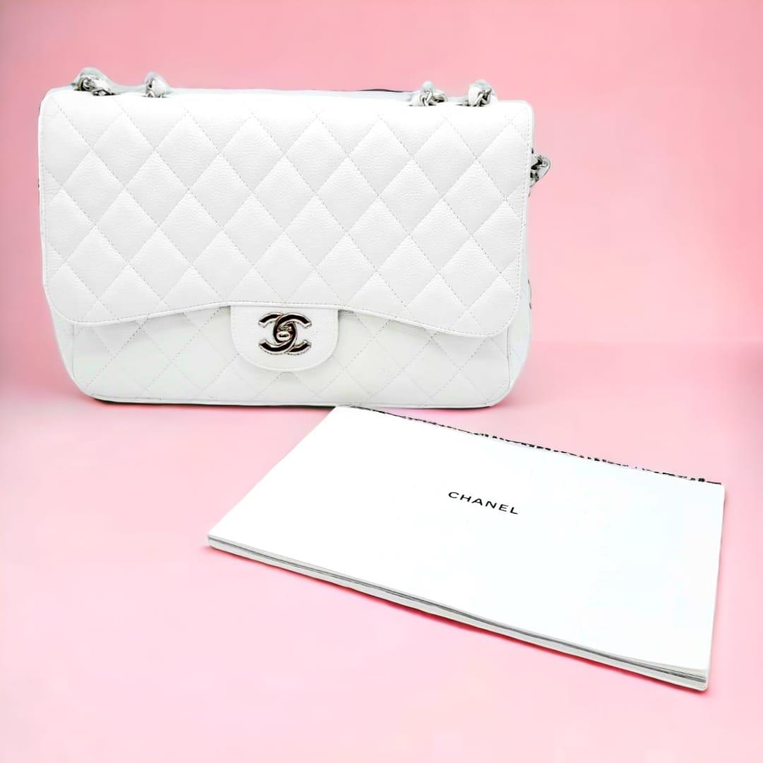 An exquisite Chanel White Caviar Classic Flap Bag. The interior is lined in a tonal leather, care - Image 5 of 11