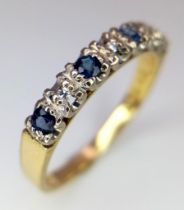 AN 18K YELLOW GOLD DIAMOND AND SAPPHIRE RING. Size M, 2.4g total weight.