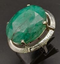 A 50ct Brazilian Oval Cut Emerald Ring. Set in 925 Sterling Silver. Size P. Comes with a