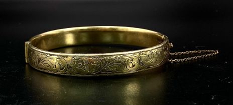 A Vintage 9 Carat Yellow Gold, Metal Core Scroll Detail, Bracelet. 6.2cm Inner Width. 14.87 Grams