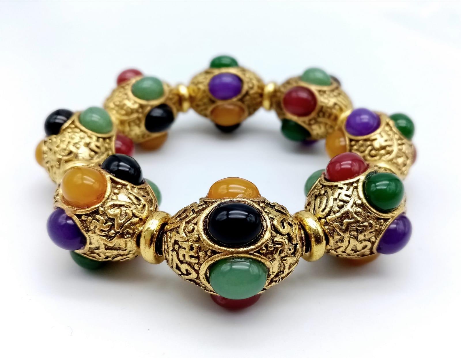 A Gilded Tibetan Style Bracelet with Multi-Colour Jade Cabochon Decoration. Gilded spacers. - Image 3 of 4