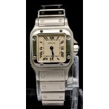 A Cartier Santos 1565 Ladies Quartz Watch. Stainless steel bracelet and case - 24mm width. White