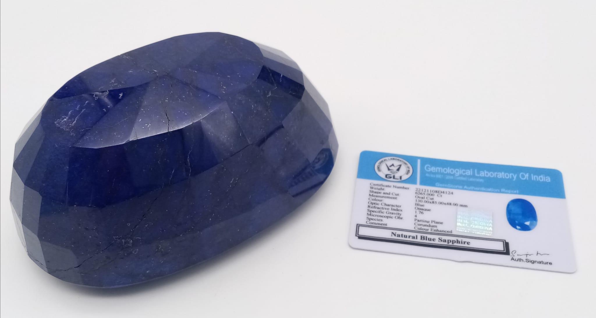 A Gargantuan 6265ct Earth-Mined African Blue Sapphire Gemstone. Oval Shape. GLI Certified. This - Image 2 of 4