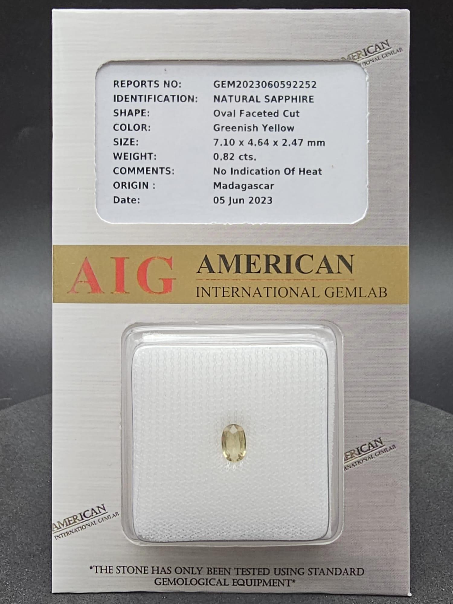 A 0.82ct Yellow Sapphire Madagascan Untreated Gemstone. AIG Certified. Comes in a sealed container. - Image 2 of 3