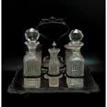 A Beautiful Vintage Possibly Antique Silver Plate Cut Glass Six-Piece Cruet Set. Four pedestal feet.