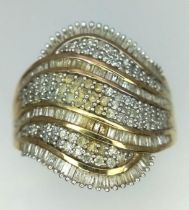 9kt Yellow Gold Fancy Diamond Ring. 1.10ctw Diamond. WEIGHT: 4.8g Size R/S