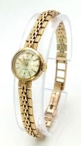 A 1960 9K Gold Rolex Precision Ladies Watch. Original Rolex 9K gold bracelet. 9K gold case - 15mm.