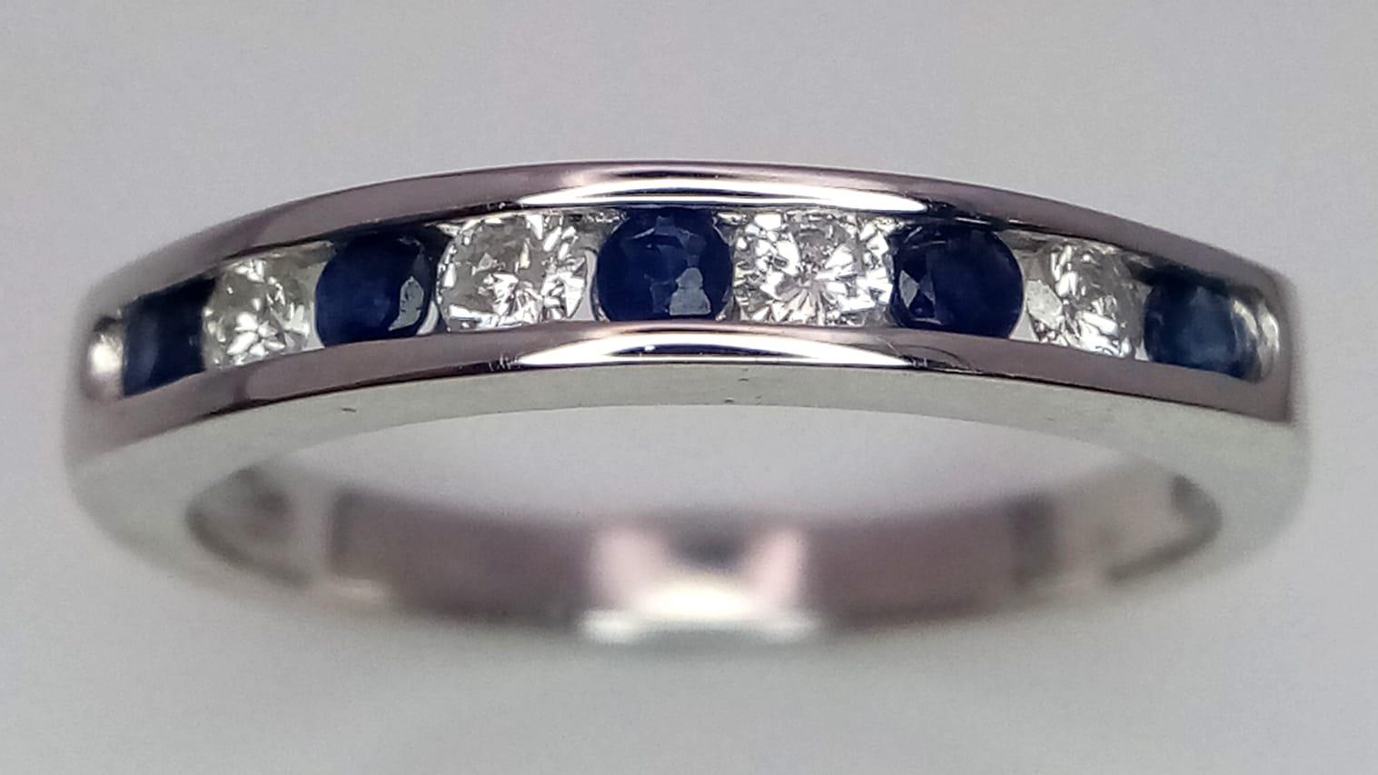 18k white gold diamond and sapphire half eternity ring. Weight: 3.5g Size N (dia: 0.20ct/ sapp: 0. - Image 2 of 4