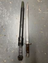 A WW1 British 1907 SMLE Bayonet with Scabbard and Frog. The bayonet is dated 1916 and is marked 2