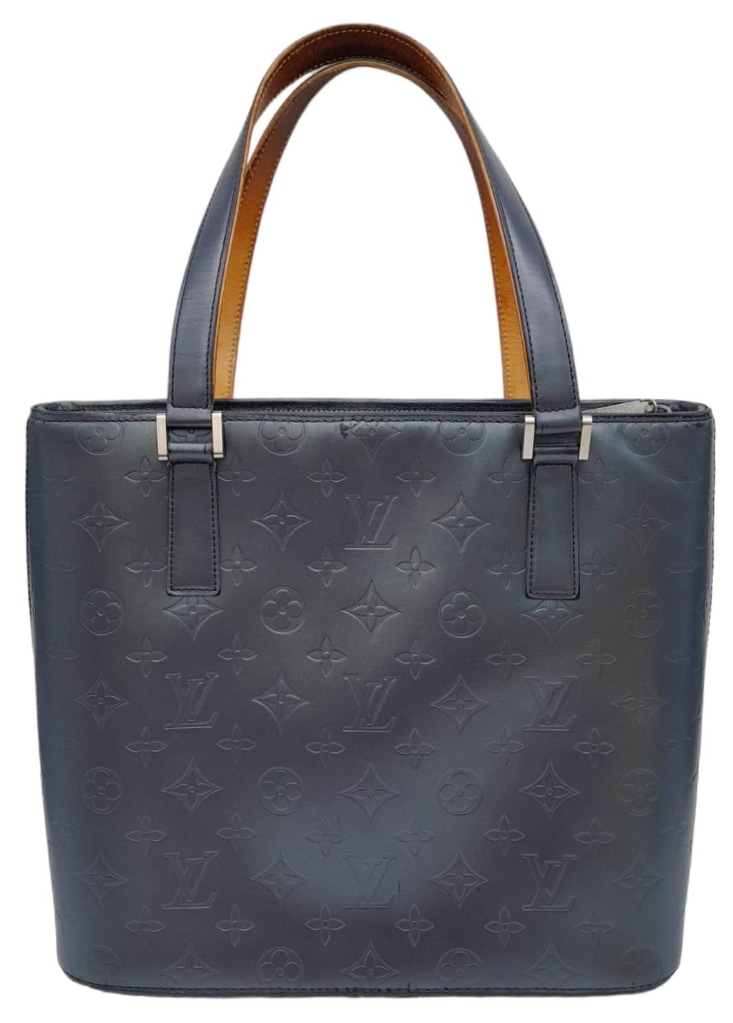 A Louis Vuitton Metallic Grey 'Stockton' Bag. Monogram leather exterior with silver-tone hardware - Image 2 of 9