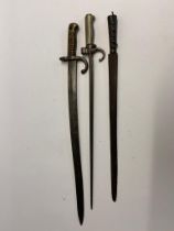 Three Swords/Bayonets - 1866 Chassepot - 69cm. 1886 Label - 64cm plus an unknown -58cm. ML358