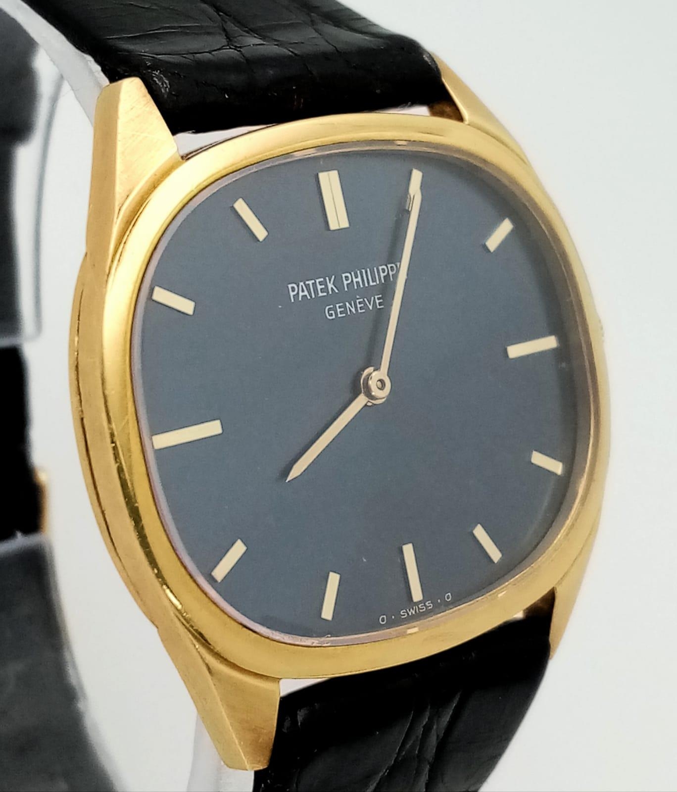 A Vintage Patek Philippe 18K Gold Watch. Black leather strap - 18k gold buckle. 18k gold case - - Image 4 of 6