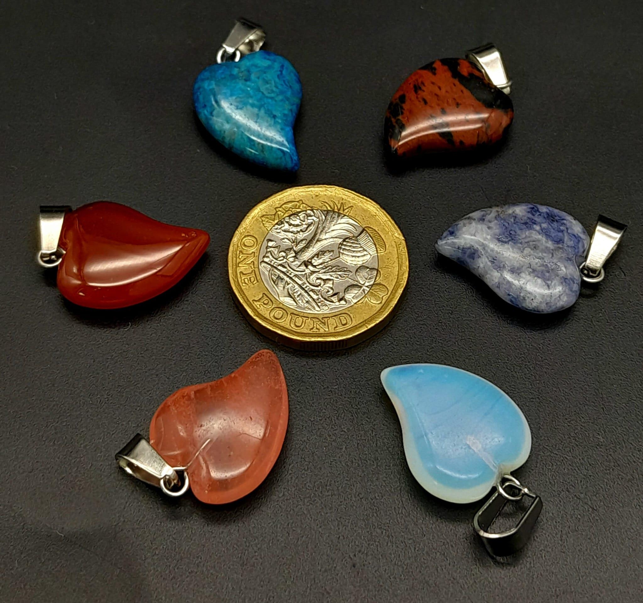 Six Heart-Shaped Gemstone Pendants. 2.5cm - Image 2 of 3