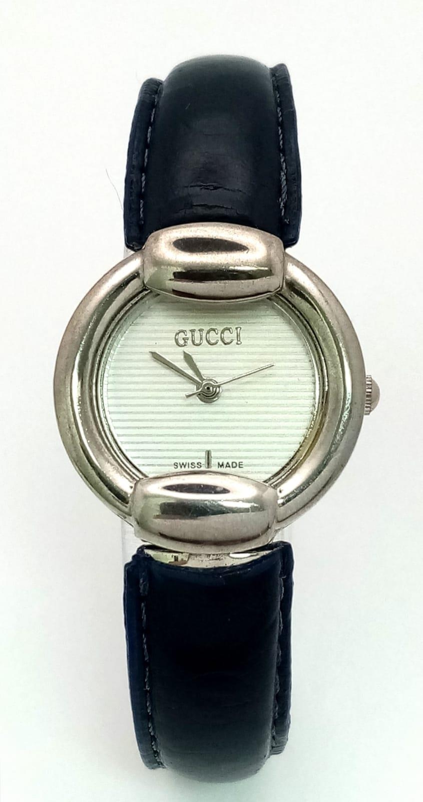 A Designer Gucci Quartz Ladies Watch. Blue leather and steel bracelet. Circular stainless steel case - Image 2 of 6