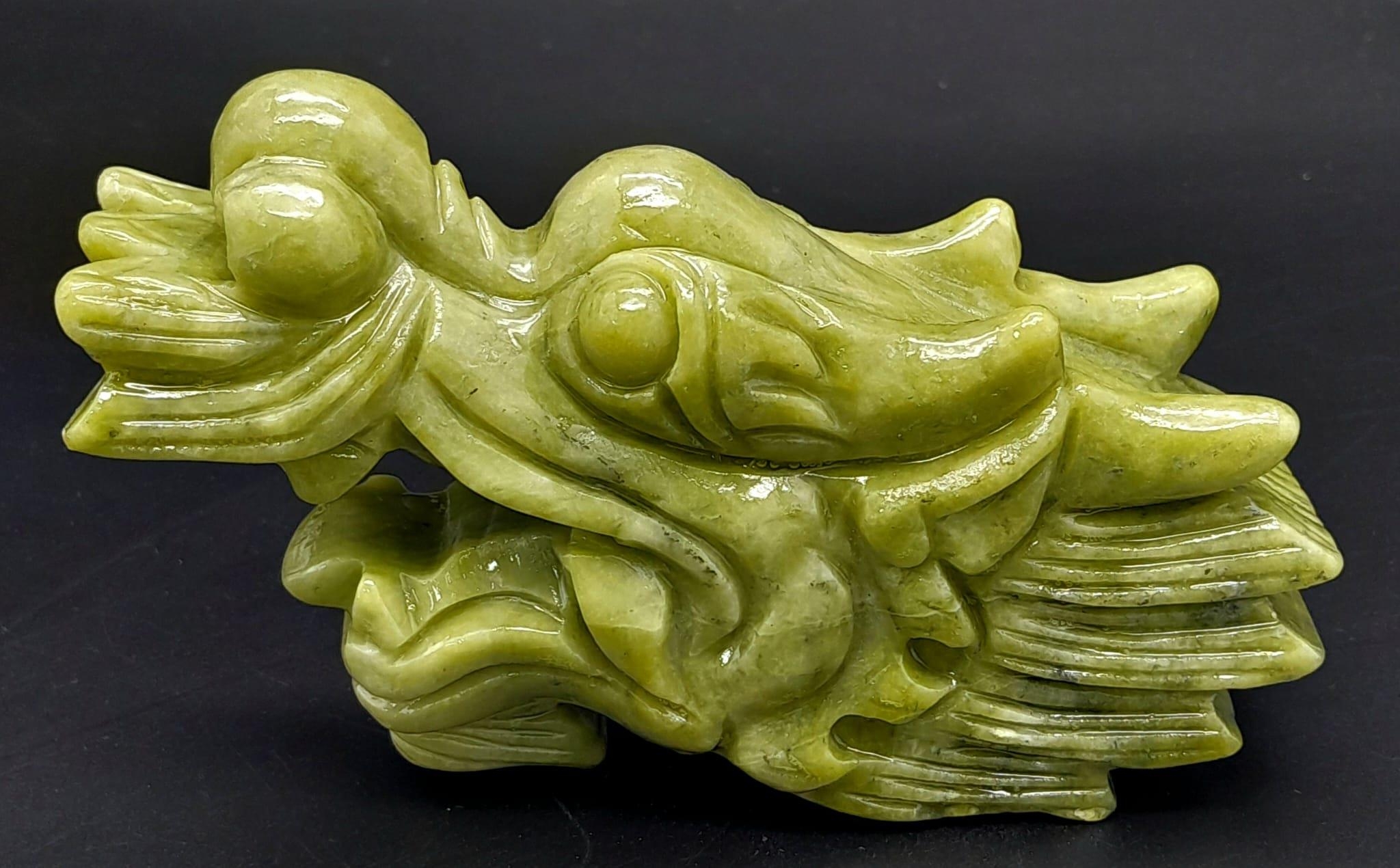 A Chinese Green Jade Dragon's Head Figure. The perfect ornament.... Or paperweight. 15cm x 8cm. 570g