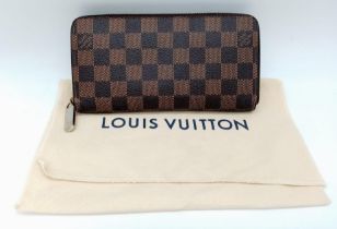 Louis Vuitton Zippy Wallet. Classic LV checkerboard design, gold toned hardware and quality