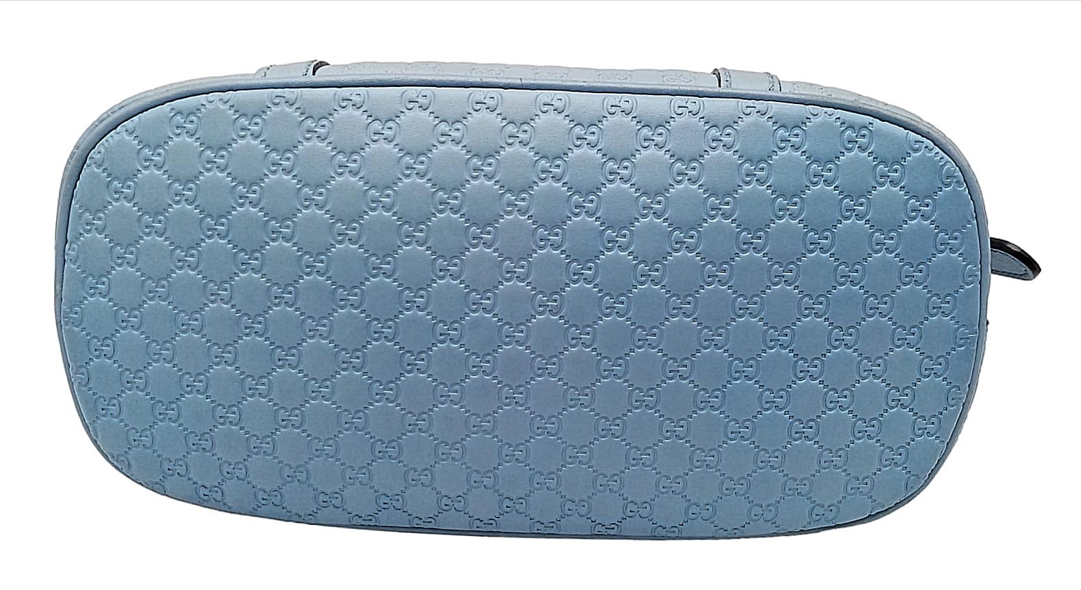 A Gucci Cornflower Blue Micro Guccisima Dome Bag. Monogram leather exterior with rolled leather - Image 8 of 11