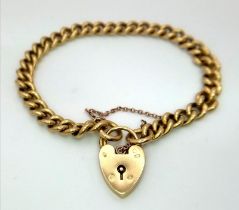 A Vintage Possibly Antique 18K Yellow Gold Bracelet with Heart Clasp. Multiple hallmarks on links.