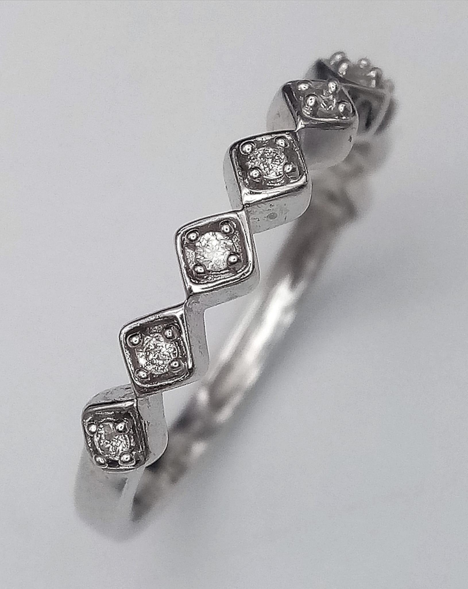 A 9K WHITE GOLD DIAMOND SET BAND RING, 9 round cut diamonds 1.9G SIZE N 1/2 - Image 2 of 5