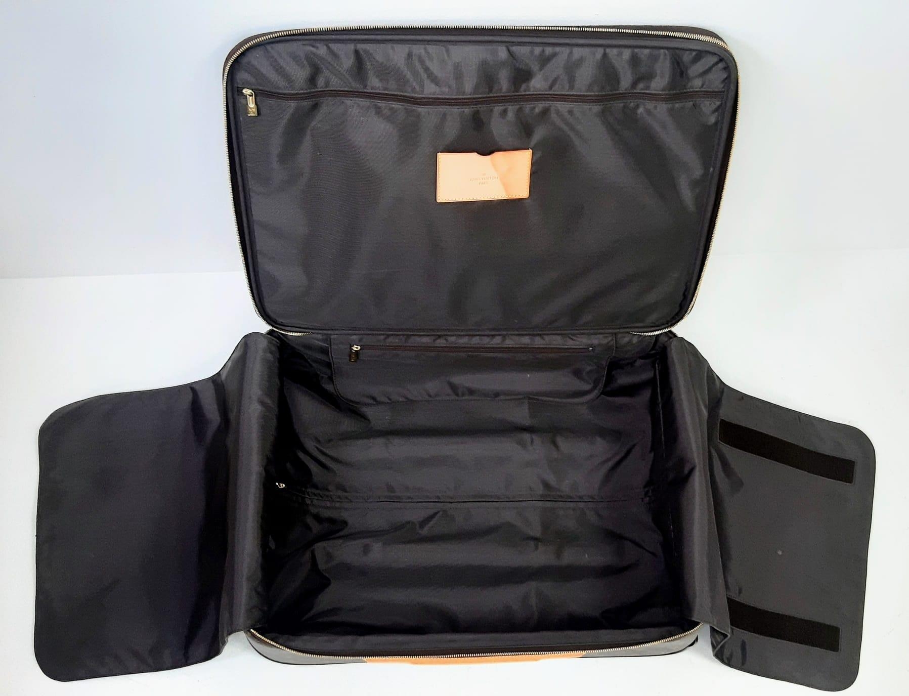 A Louis Vuitton Monogram Pegase Suitcase. Durable leather exterior. Front compartment with zipper, - Image 7 of 9