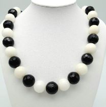 A White Agate and Black Onyx Statement Necklace. Large 16mm faceted beads. 55cm necklace length.