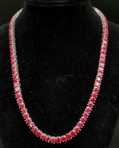 A Ruby Gemstone Tennis Necklace on 925 Silver. Approximately 45cm in length, 43g total weight.