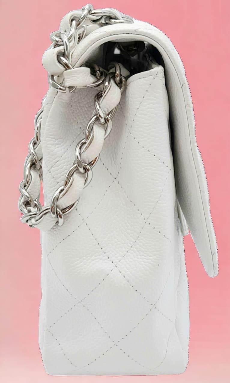 An exquisite Chanel White Caviar Classic Flap Bag. The interior is lined in a tonal leather, care - Image 2 of 11