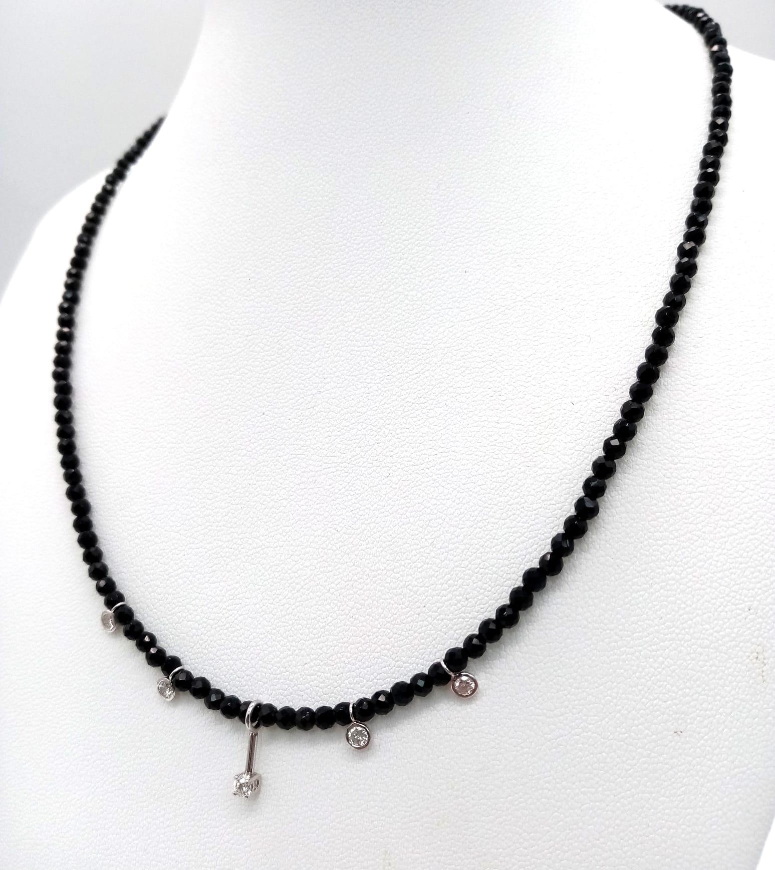 A Black Spinel Small Bead Necklace with Five Stone White Diamond Decoration. 0.5ctw. 14k gold clasp. - Image 2 of 5