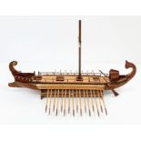 A Hand Crafted Wooden Viking Long Ship in Excellent Condition. 60cm in length.