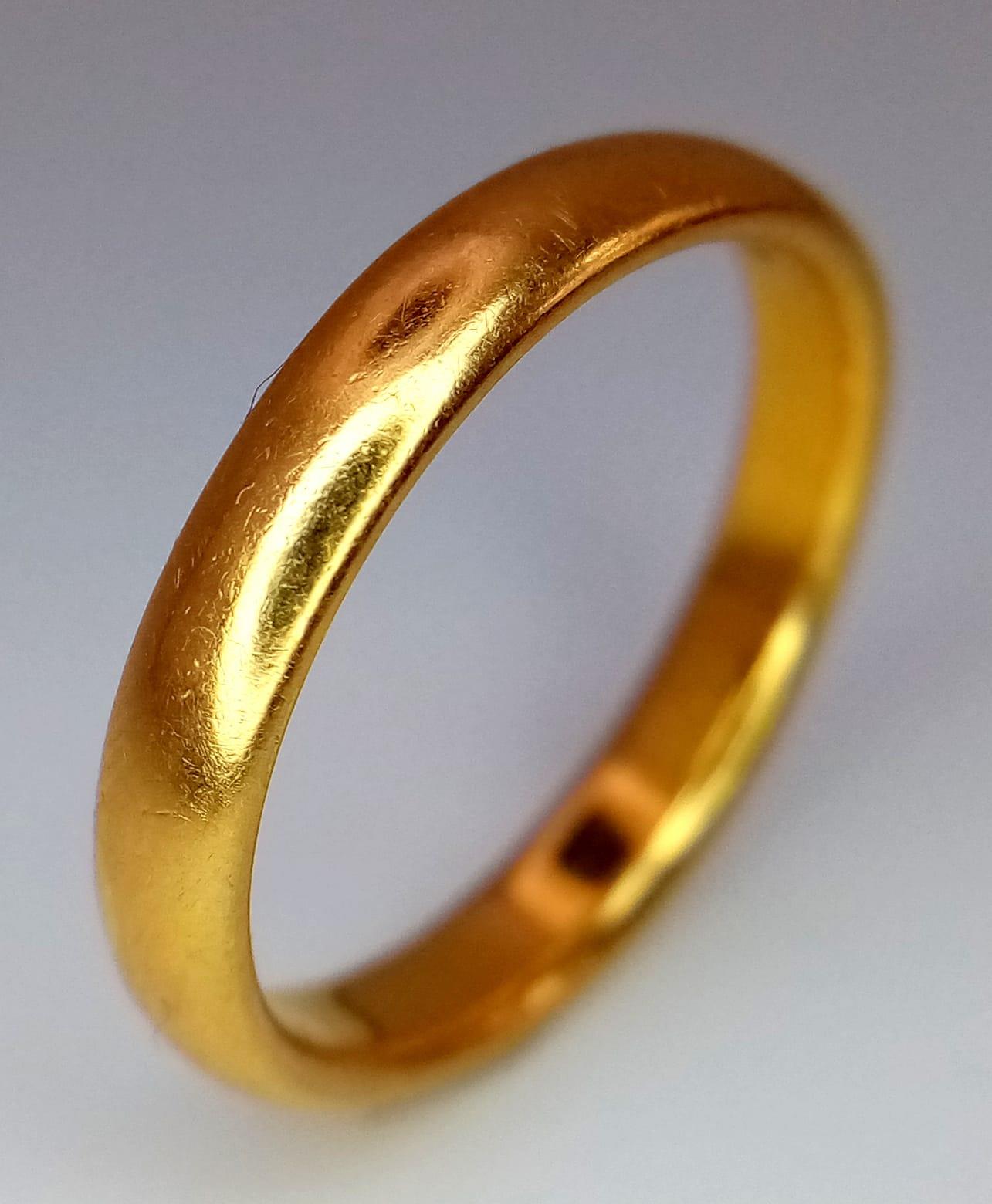 A Vintage 22K Yellow Gold Band Ring. Size P. 5.11g weight. Full UK hallmarks.