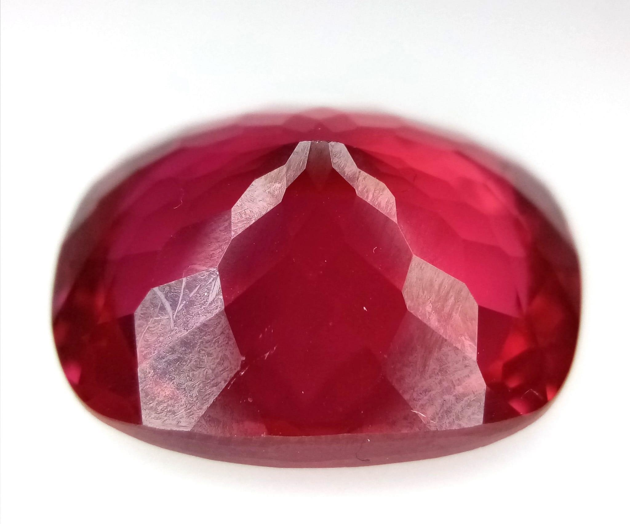 A 27ct Pink/Red Oval Cut Kunzite Gemstone. Well faceted with no visible marks or inclusions. No - Image 2 of 4