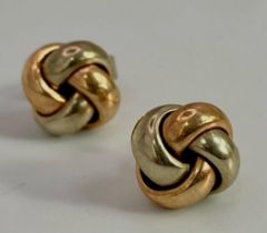 A Pair of Yellow and Rose Gold Knot Stud Earrings. 1.12g weight.