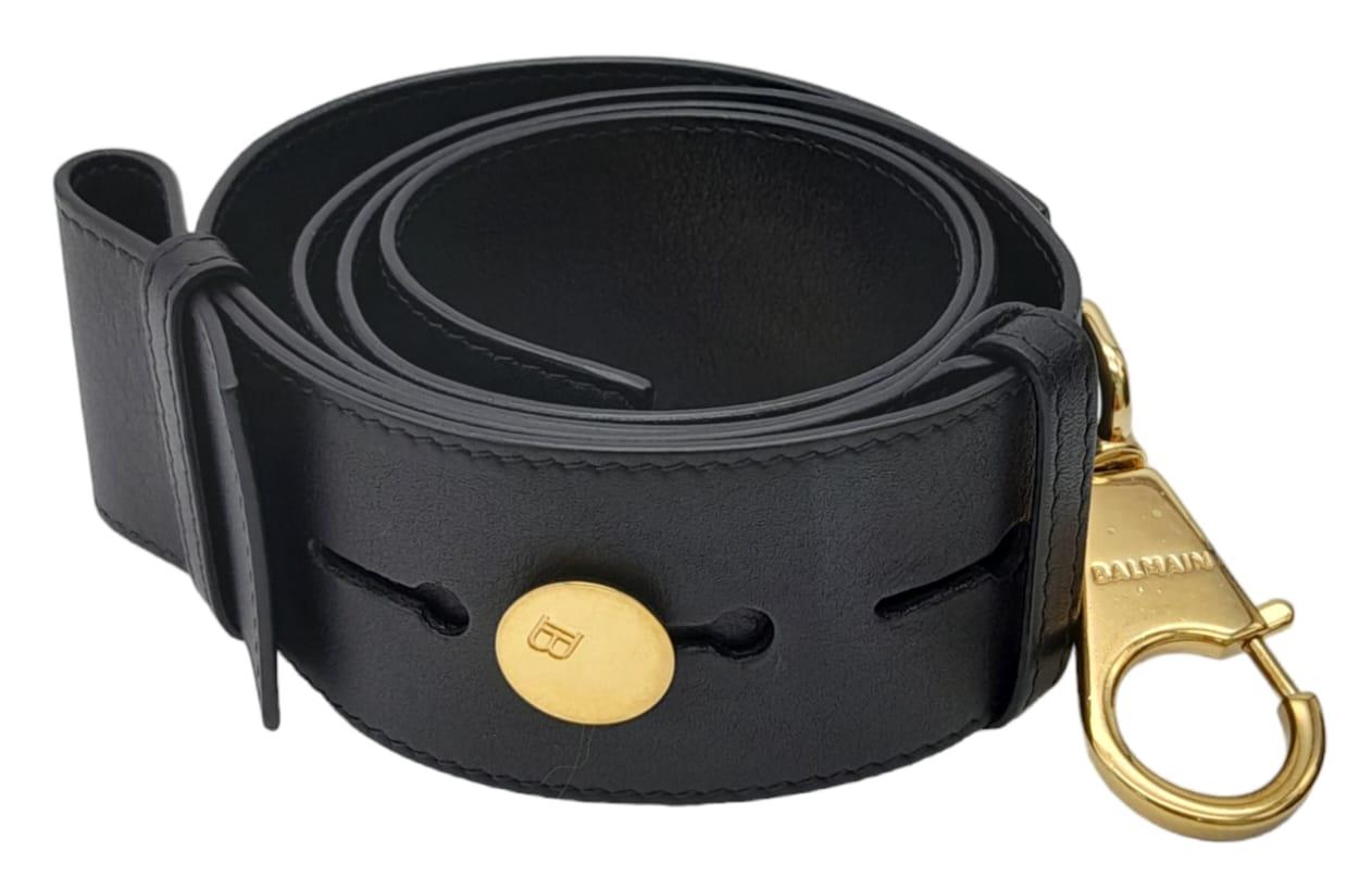 A Balmain Black 'Twist' Crossbody Bag. Leather exterior, with gold-tone hardware and zipper and - Image 5 of 10