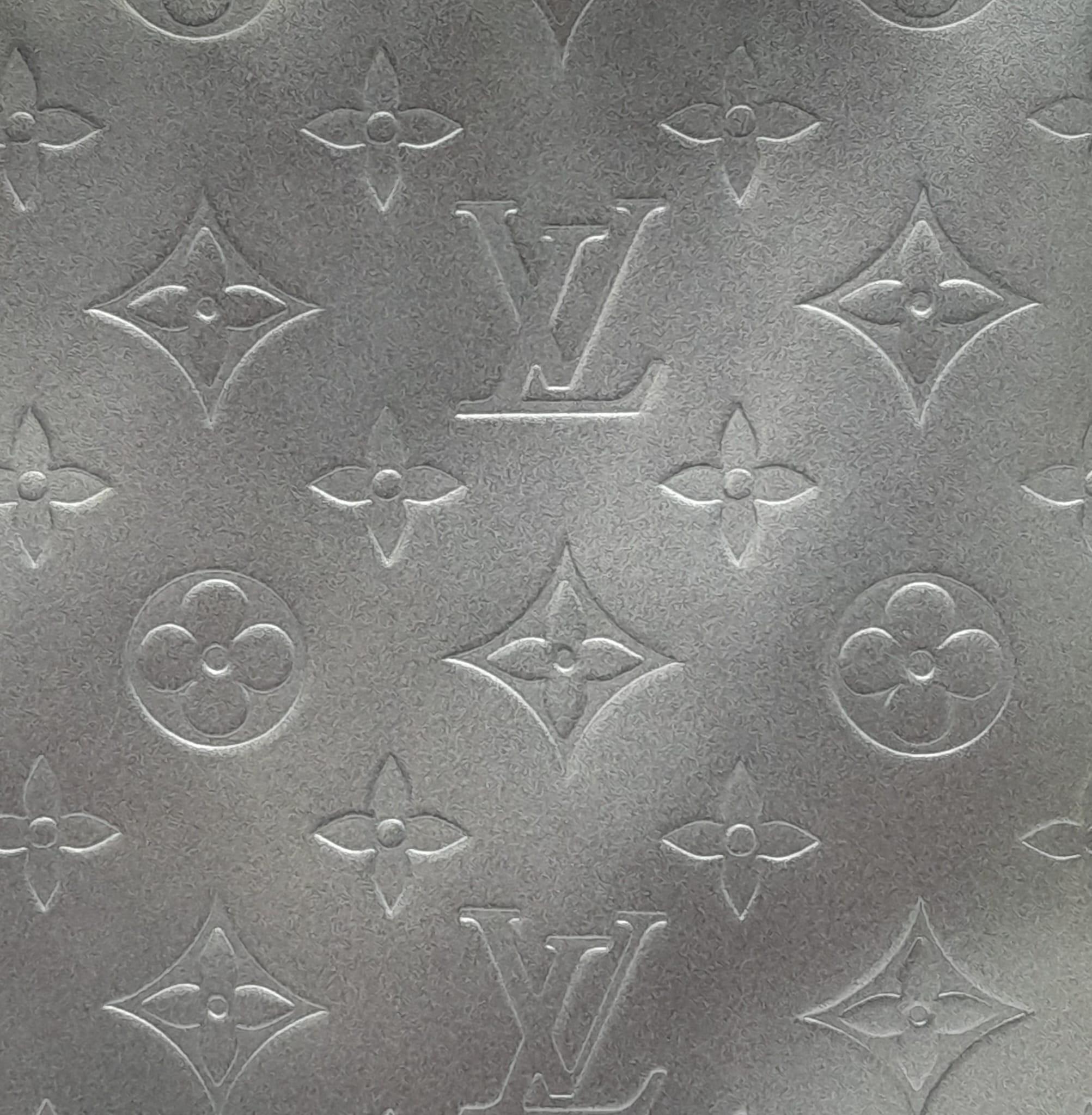 A Louis Vuitton Metallic Grey 'Stockton' Bag. Monogram leather exterior with silver-tone hardware - Image 9 of 9