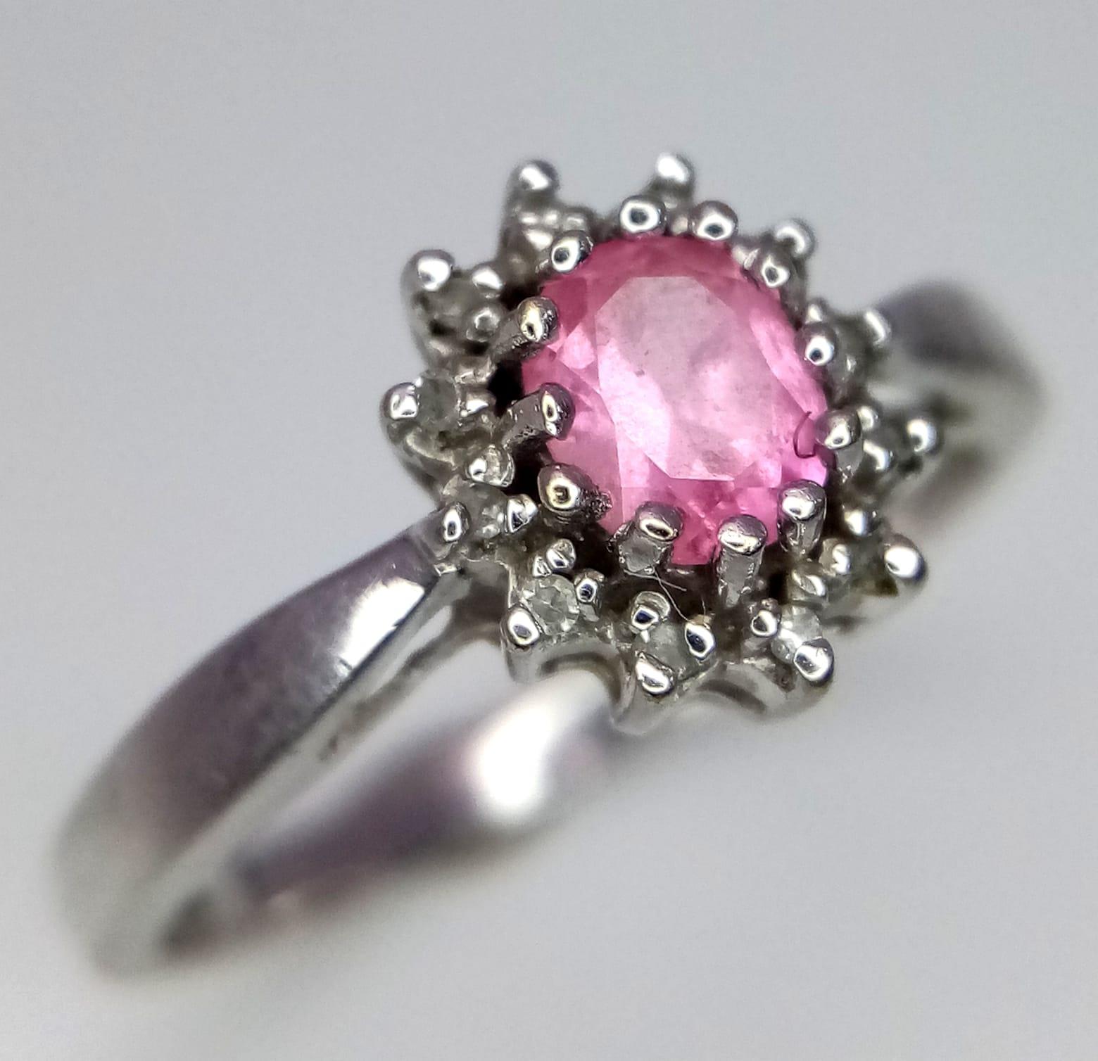 9k white gold diamond and pink sapphire ring. Weight: 2.2g Size: M (dia:0.12ct/sapp:0.40ct) - Image 2 of 4