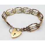A Vintage 9K Yellow Gold Gate Bracelet with Heart Clasp. 18cm. 8g weight.